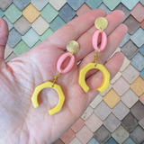 Pink and yellow crescent earrings
